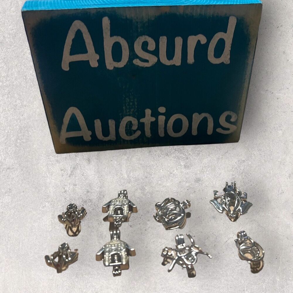 Silver Animal Shaped Pearl Cage Pendants and 20 or 24 inch necklaces.